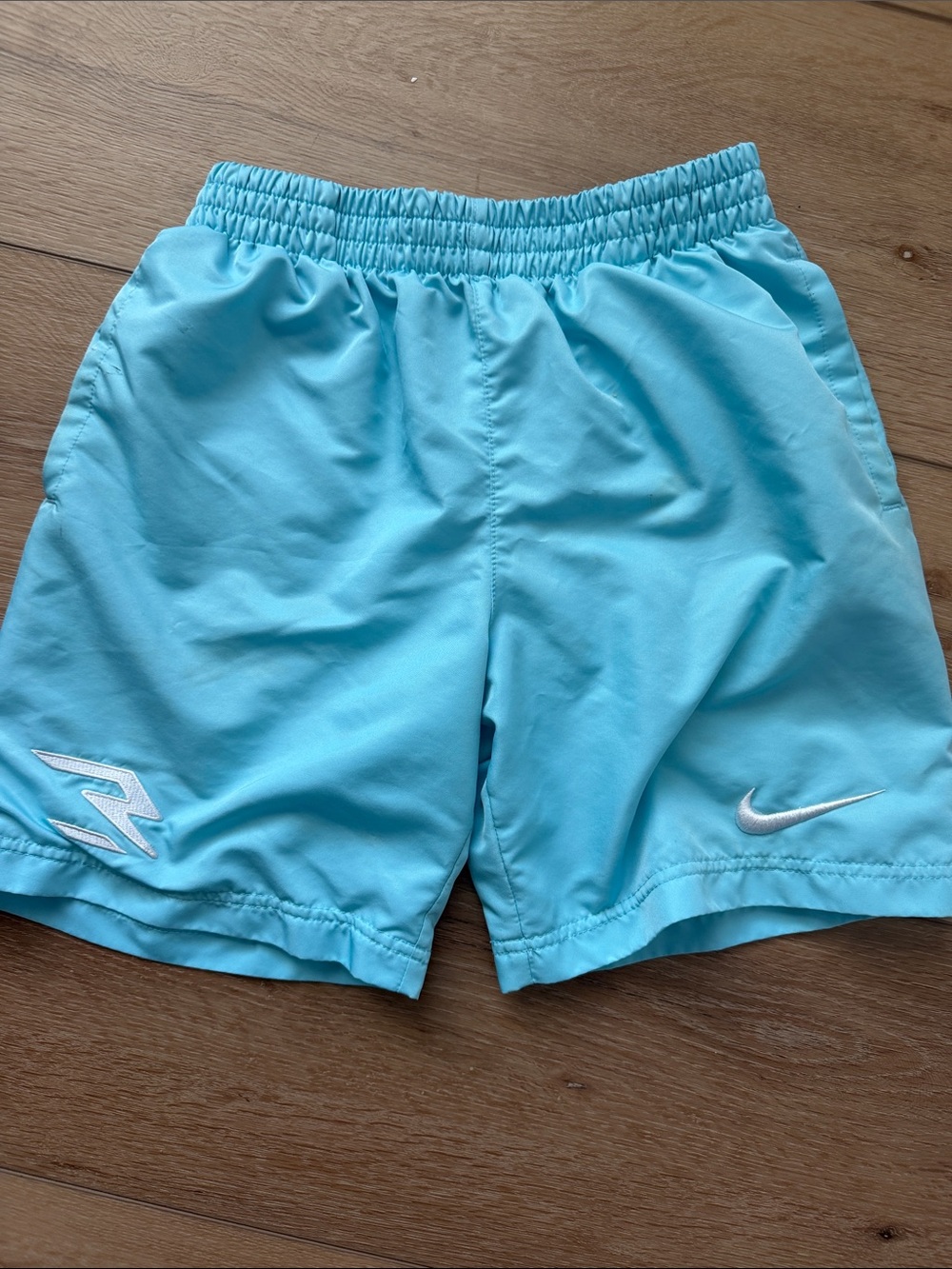 Nike Men's Aqua Athletic Shorts with White Logos